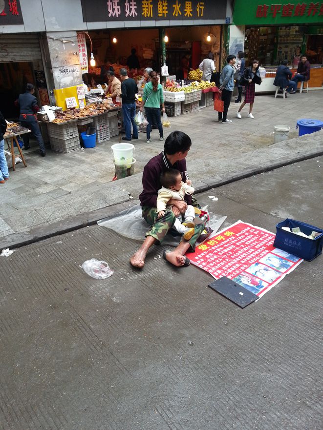 发现于重庆杨家坪前进路菜市场，明显是骗子